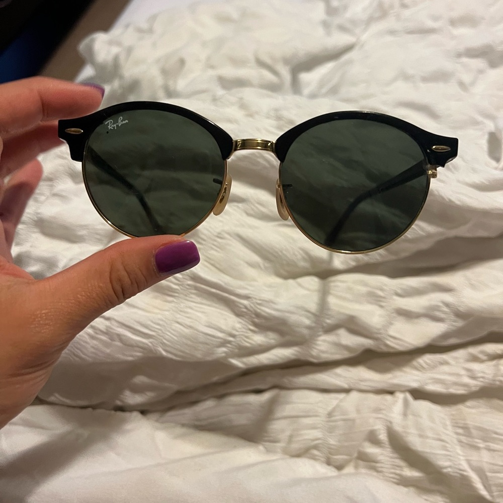 Ray ban sunglasses- has a chip on the side (circled in blue on the last photo)